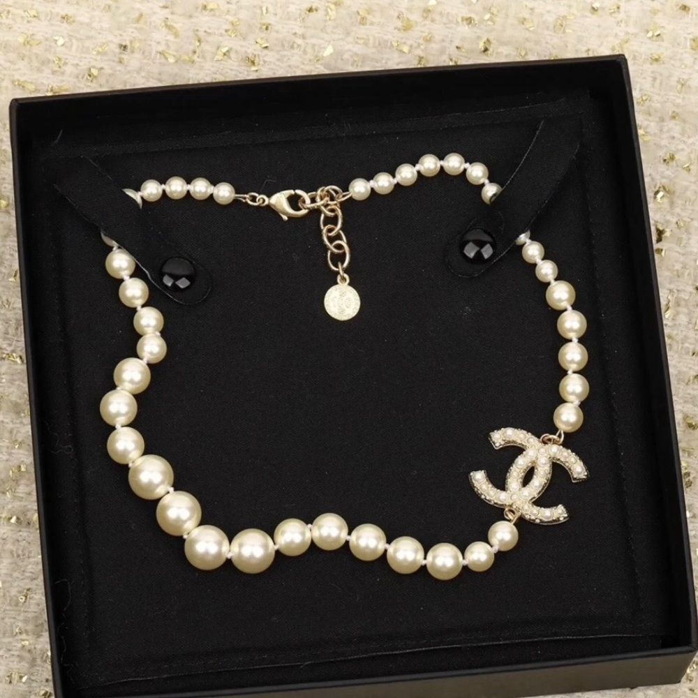 CHANEL Pearl Necklace with Gold Accents